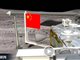 嫦娥五号首次实现地外天体起飞独立展示国旗